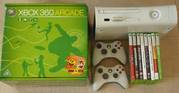 Xbox 360 arcade console. 2 controllers and 8 games. £145